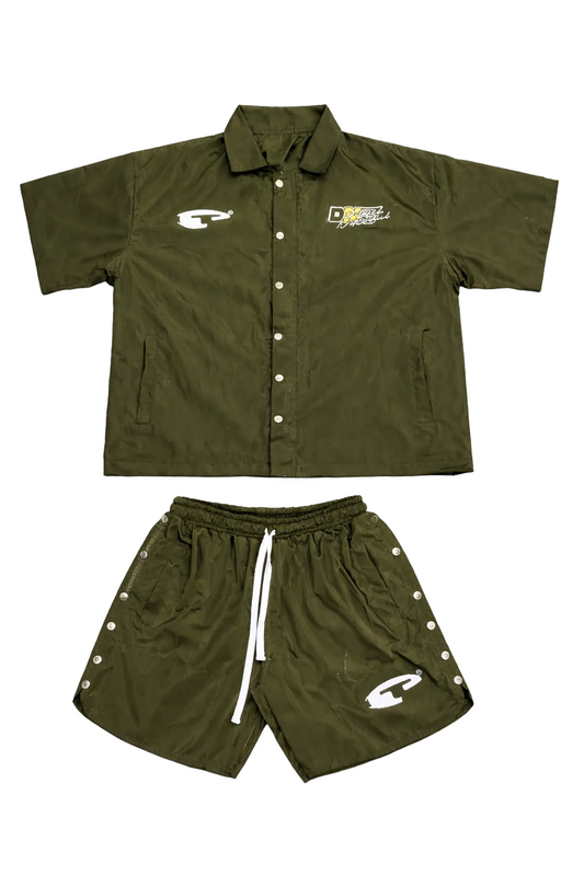 Green jacket and shorts set with brand logos on a gray background