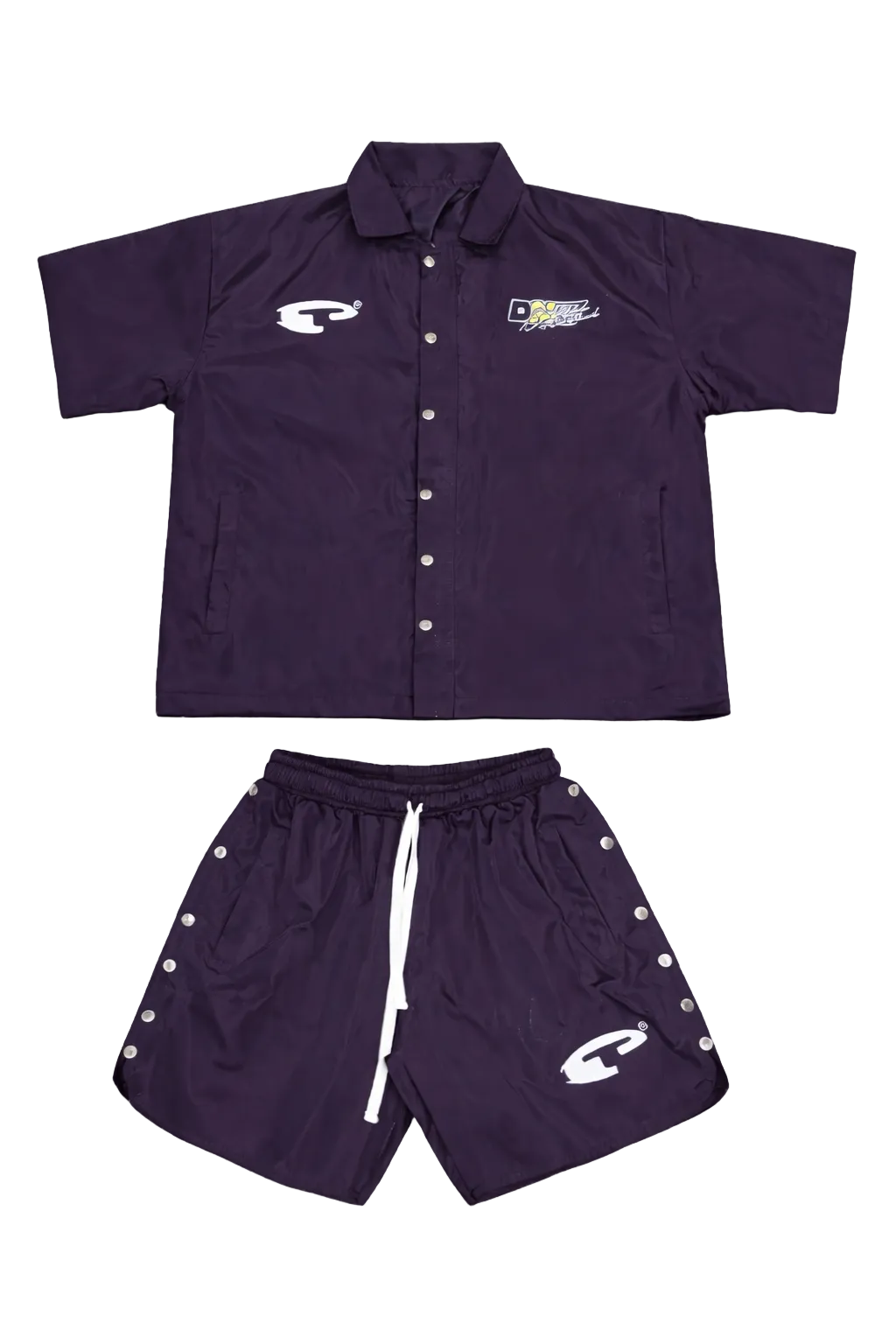 Purple sports outfit with button-up shirt and shorts on a gray background